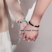 Elastisches Perlen Armband Howlith Türkis Schwarz